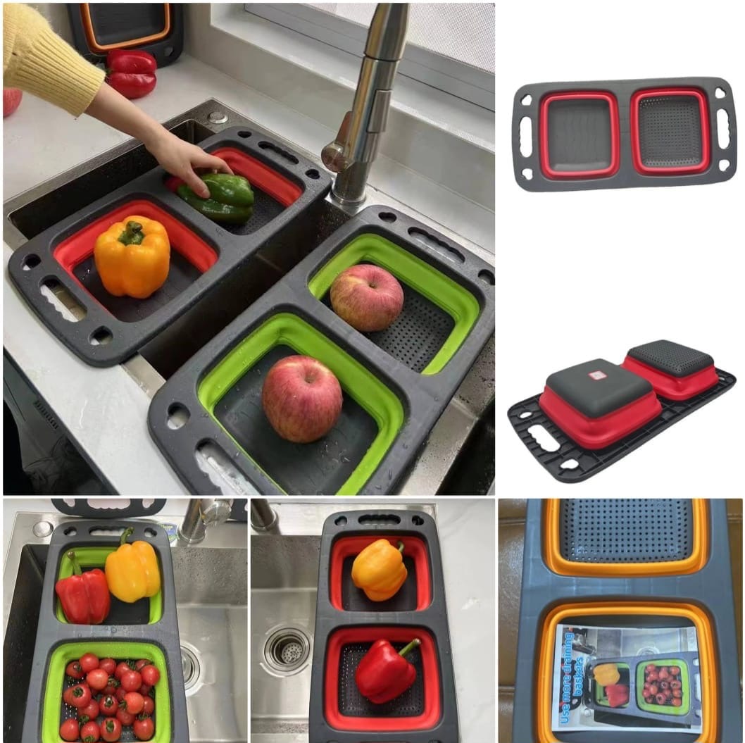 Collapsible over-sink dual colander and strainer set in use, showing foldable silicone baskets with fruits and vegetables